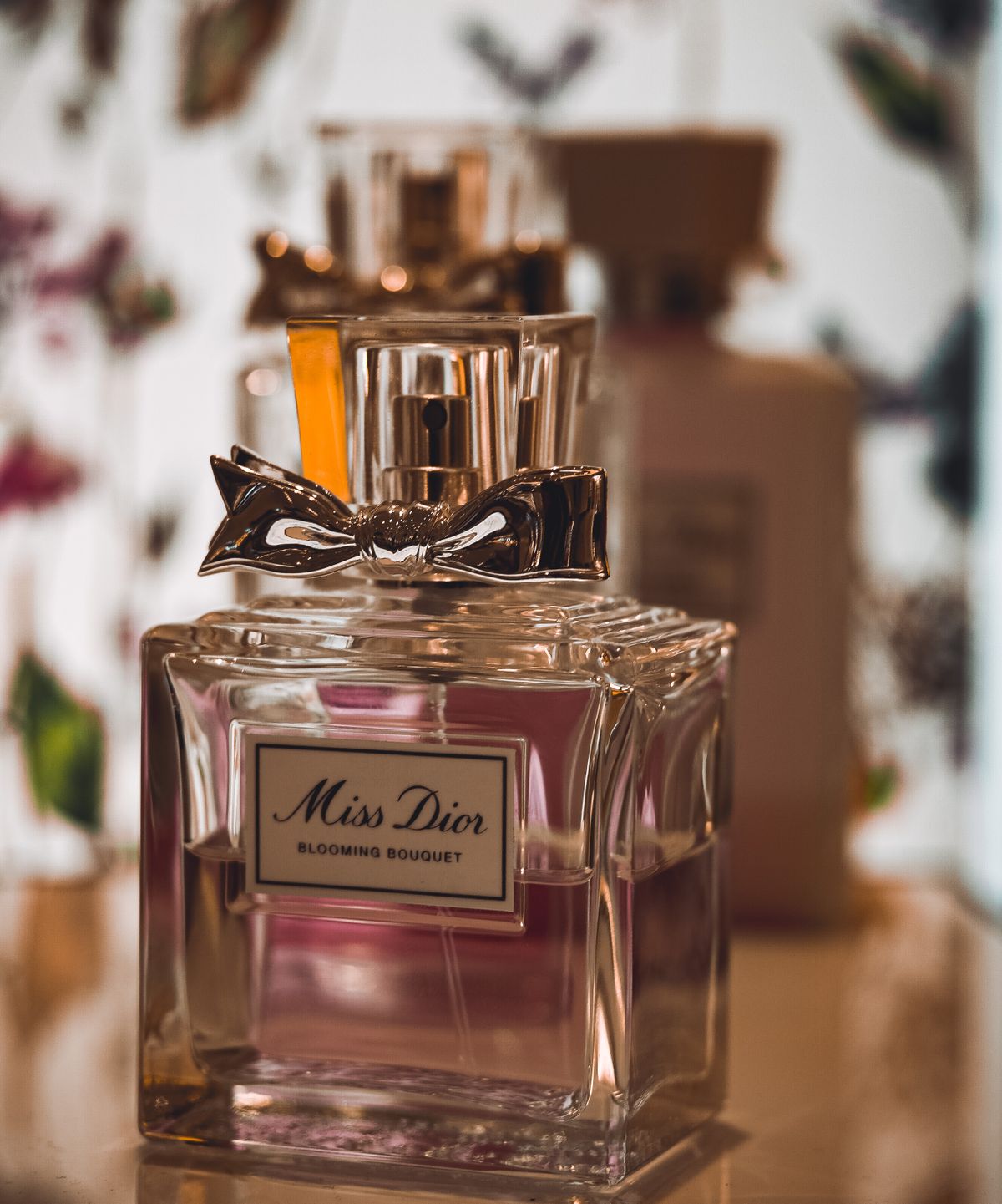 Miss Dior perfume bottle with blooming bouquet design