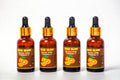 Serum bottles arranged on white background